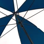 Close-up of a blue and white X-brella umbrella showing its structure.